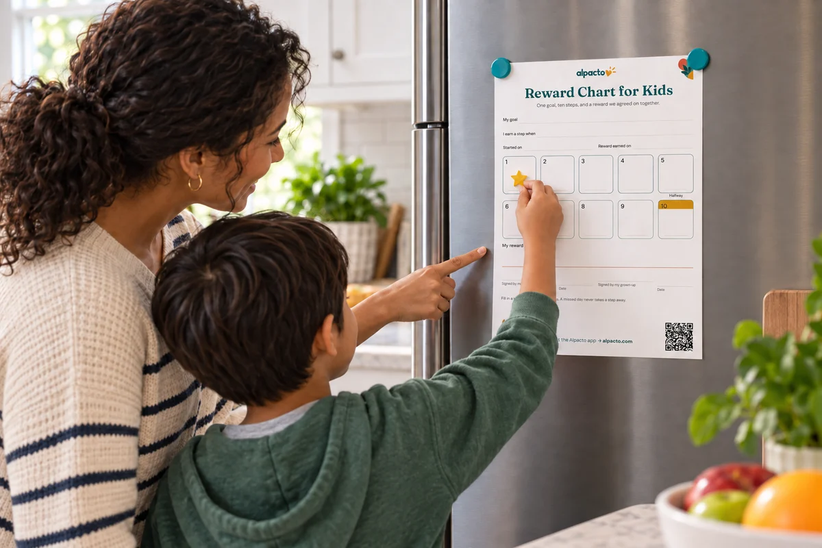 A child putting the first star on a printable reward chart for kids on the fridge, with a parent pointing at the reward line